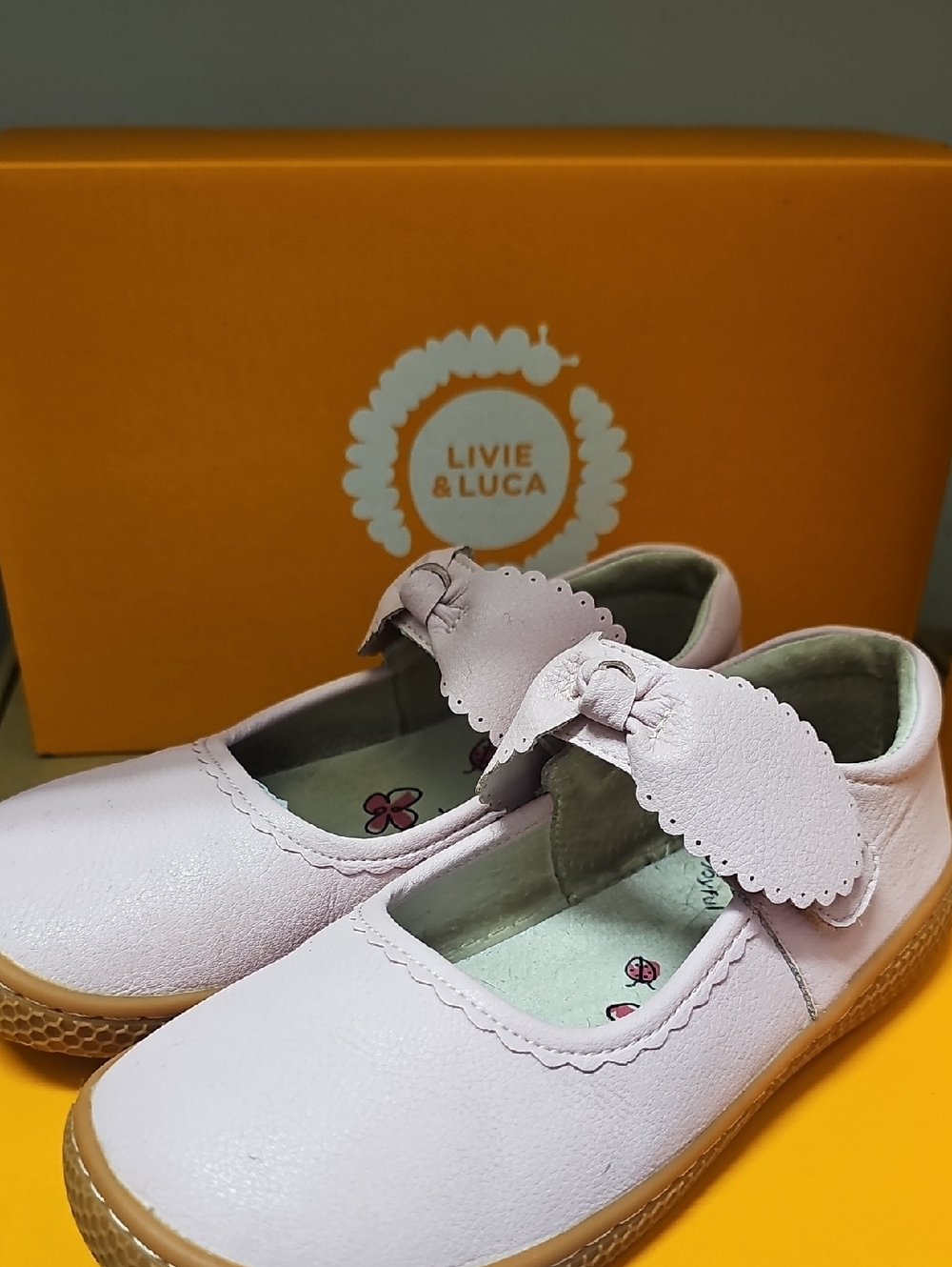 Livie & Luca Girls' Light Pink Leather Mary Janes with Bow Strap